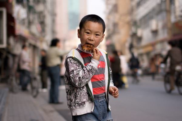 boy eating outside